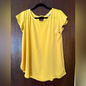 Bright yellow LOFT blouse.